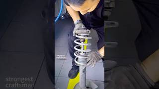 Suspension Breakdown: Watch This Mechanic Remove Shock Absorbers Like a Pro! 🔧🚗 #CarRepair