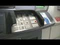 How to spot a skimmer scanner at the ATM