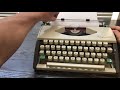 1966 olympia sf deluxe typewriter cursive script ultraportable