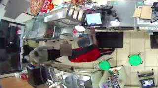 Raw video: Armed robbers strike at 7-Eleven store