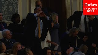 BREAKING NEWS: Heckler Forced To Leave State Of The Union After Screaming At Biden