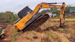 Excavator climbing, 90-degree high slope