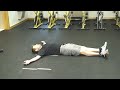 supine scorpian face up warmup exercise.mpg