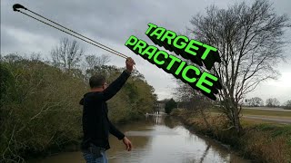 Throwing Rock Sling At Target