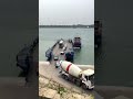 Cement mixer trucks board the ferry to cross the Yangtze River. Safety is the first priority on