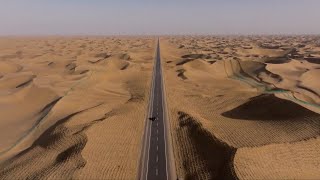 New highway opens in largest desert in China's Xinjiang