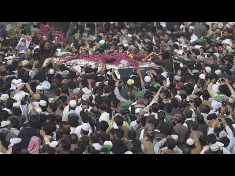 Thousands Of Pakistanis Mourn At Killer's Funeral - YouTube