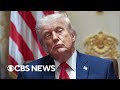 Why did Trump postpone signing an AI executive order?