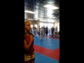 Daniela Robinson sings the National Anthem at taekwondo tou