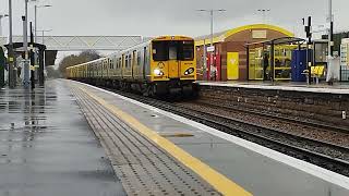 Class 507016 and 508125 pauses at Aintree with an ECS movement