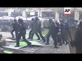 Confrontations in Paris as fuel protests escalate; water cannon