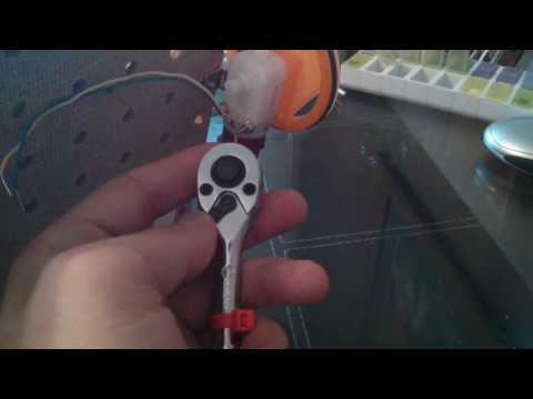 tightening and loosening nuts with socket wrench tightening and loosening nuts with socket wrench