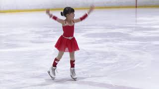 Katie and daddy 2018 Riverside Icetown Christmas ice skating performance