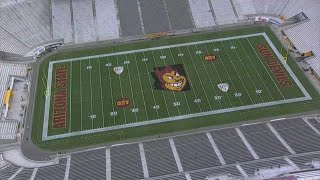 Grounds crew fixes field at ASU Stadium, creates new logo