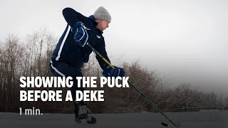 Showing The Puck Before A Deke