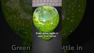 #mesmerizing super #slowmotion video of green #glitter in a #sensory bottle #shorts