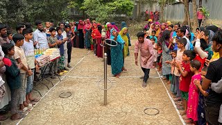 রিং ছুড়ে গ্রামের আপারা ছোলা, খেজুর, তেল, আটা, চিনি জিতে আনন্দে মেতে উঠলো। নতুন গ্রামে মজার খেলা