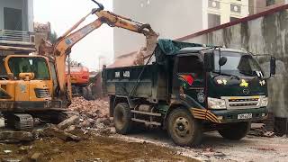 Construction demolition excavator and dump truck collection