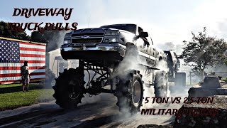 DRIVE WAY TRUCK PULLS WITH MILITARY TRUCKS AND MEGA MUD TRUCKS