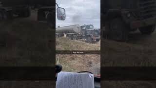 Manure Tank Vac Arm Loading from Semi