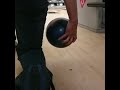 Demonstrating how to hook a bowling ball