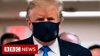 Coronavirus: Donald Trump finally wears mask in public - BBC News