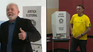 Bolsonaro e Lula votam | AFP