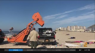 Parks Department Steps Up Efforts To Clean Up Trash Left Behind By Crowds At Rockaway Beach