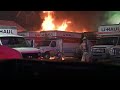 Fire tears through U-Haul rental lot in Southeast Portland, damaging several trucks