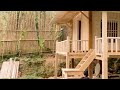 The girl built big, beautiful house with wood by herself