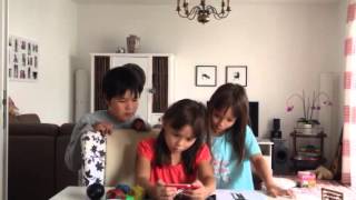 Three kids sing a song