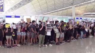 Passengers voice concerns over Hong Kong airport protests