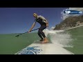 sup wave riding at muizenberg cape town