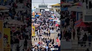 ππππ’π₯π π§ππ π¦π§π’π₯π : Visitors Fill Santa Monica Pier as Rain Moves In