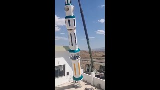 Putting a microphone on the dome of the mosque