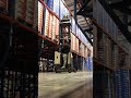 Stacking pallets in the air  on a reach truck Forklift