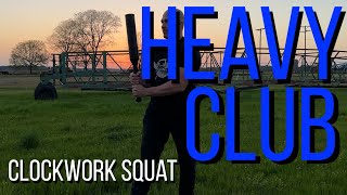 Heavy club clockwork squat