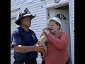 Woman tearfully reunited with dog after fire