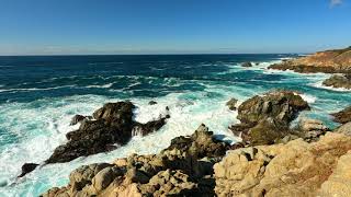 Spectacular Cliffside view of Beautiful Turquoise Waves Crashing on a Rocky Coastline - Big Sur, CA