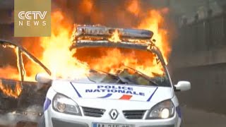 France labor protestors set fire to police car