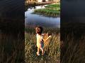 Cute baby is dancing to show off the fish