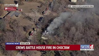 Fire crews fight house fire in Choctaw