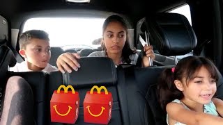 Kids Drive Thru in the car taking food