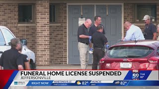 Funeral home license suspended