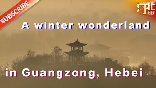 Morning fog in Guangzong, Hebei, shrouds buildings and pavilions, creating a winter wonderland.