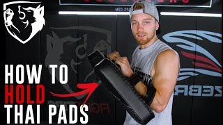 How to Hold Thai Pads for Muay Thai Kickboxing