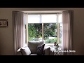 Bay Window with Motorised Roller Blinds and Sfold Sheer Curtains