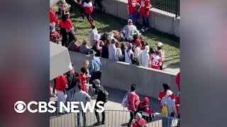 Bystanders tackle armed man running away from Kansas City Chiefs parade shooting