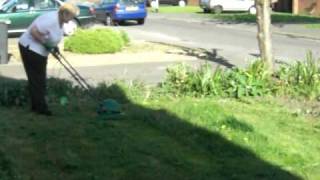 Gillian Mowing Grass