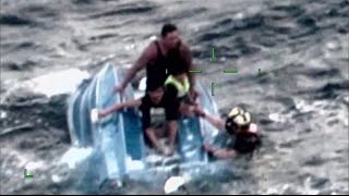 Dad and His Sons Get Rescued After Their Boat Capsizes